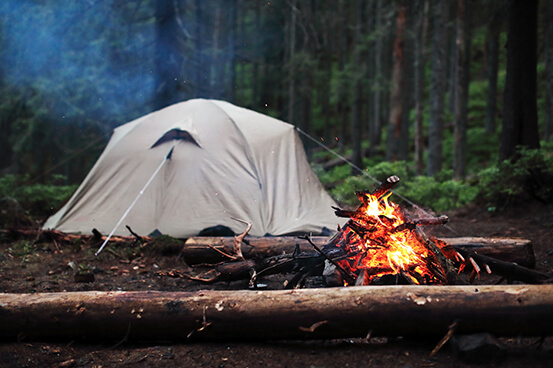 Camping by a campfire